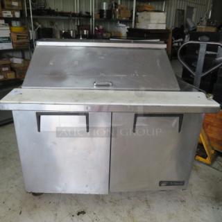 One WORKING TRUE 2 Door Refrigerated Prep Table With Cutting Board On Casters. 115 Volt. Model# TSSU-48-18M-B. 48X34X47. $4816.77 - Item #1190244