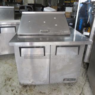 One True 2 Door Refrigerated Prep Table On Casters. 115 Volt.  Model# TSSU-36-12M-B. 115 Volt. 36X34X44. WORKING NOT COLD. $4629.00 - Item #1190245