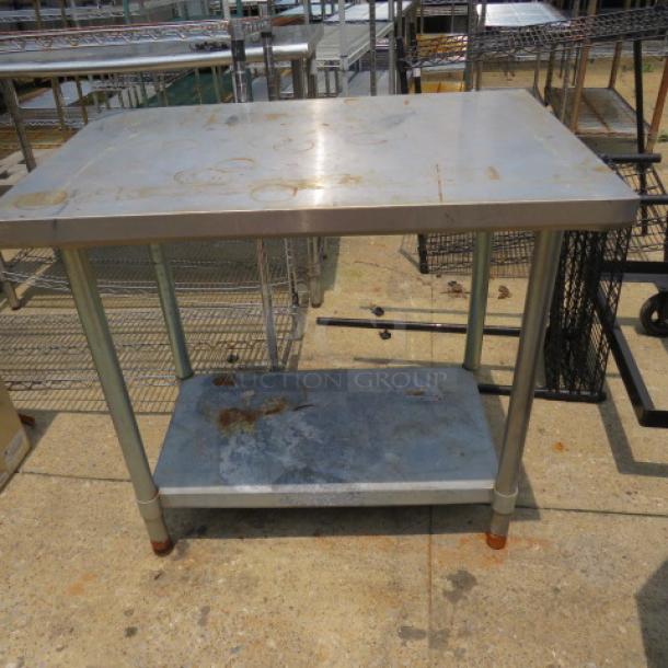 One Stainless Steel Table With Under Shelf. 36X24X33 - Image 1 of 1