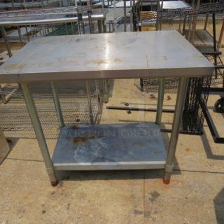 One Stainless Steel Table With Under Shelf. 36X24X33