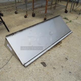 One Stainless Steel Wall Mount Shelf With Ticket Rail. 48X17X13