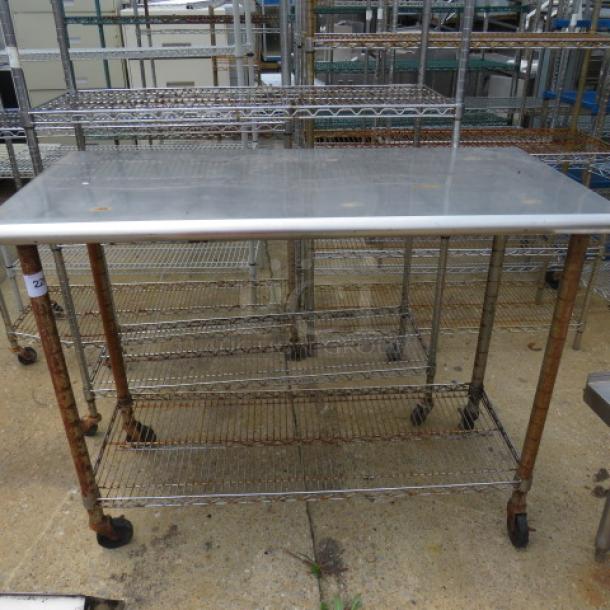 One Stainless Steel table With A Metro Under Shelf On Casters. 49.5X24X39 - Image 1 of 1