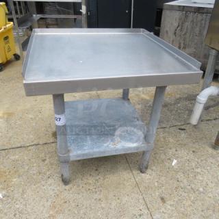 One Stainless Steel Equipment Table With Under Shelf. 24X24X25.5