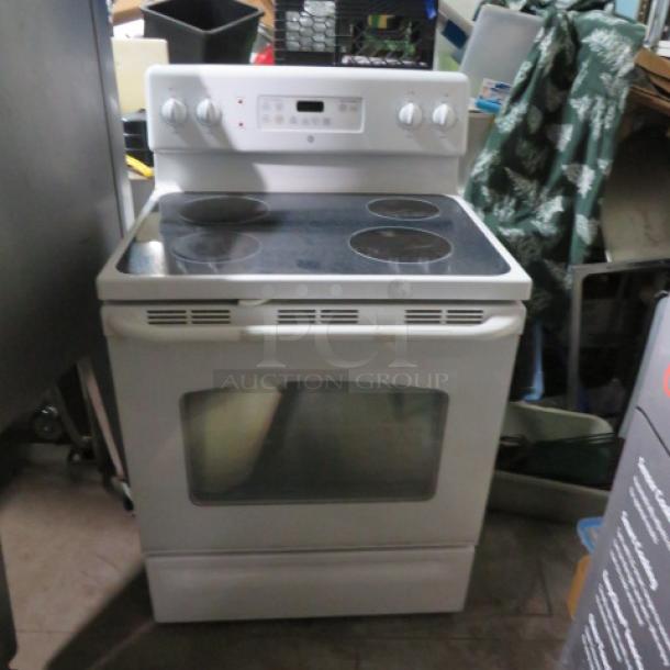 One WORKING  GE Electric  Flat Top Household Range. 30X28X48 - Image 1 of 3