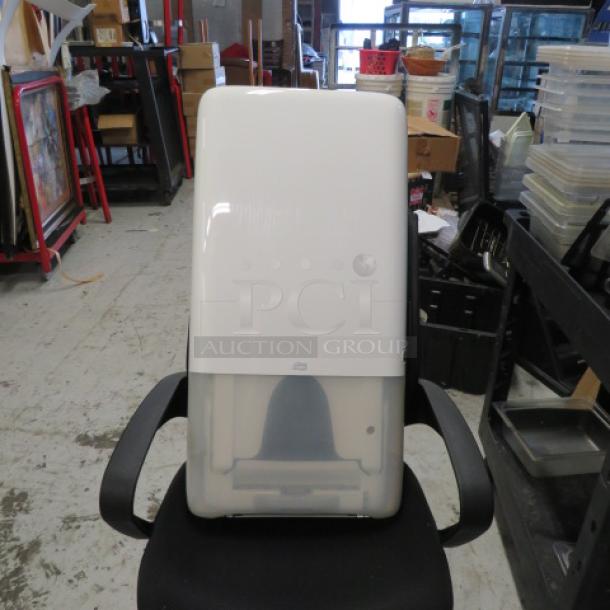One NEW Tork Hand Towel Dispenser. # 552520 - Image 1 of 1
