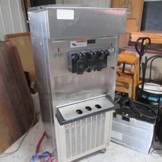 One Electro Freeze Soft Serve Machine On Casters. Model# SL-500-132. 208-230 Volt. 3 Phase.