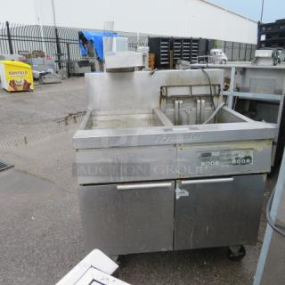 One Frymaster Large Capacity Electric Fryer With Hold Station With Heat Lamp On Casters.  480 Volt. Model# EH1721SE. 40X34X51