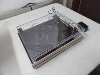 Turntable with External Speakers, Model# R612, 12V, AC power adaptor, Light Tan in color, dimensions 12.8x10.43x3.94
brand new, not in original box