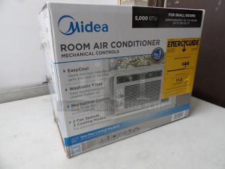 Air Conditioner, Midea Brand, 5000 BTU, Model# MAW05M1WWT, fits 23-36 inch windows
Brand New in Box