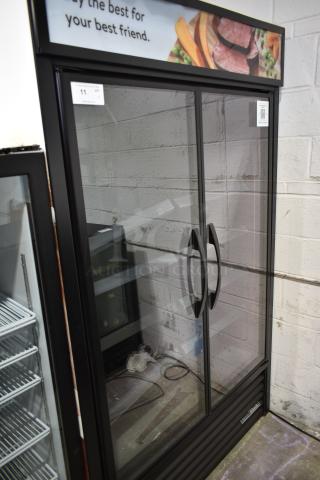 2024 True TVM-48SL-HC Metal Commercial 2 Door Reach In Cooler Merchandiser w/ Metal Shelves. 115 Volts, 1 Phase.
