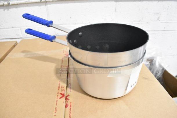 6 BRAND NEW SCRATCH AND DENT! Items Including 2 Vollrath Z434112 Wear-Ever 1.5 Qt. Tapered Non-Stick Aluminum Sauce Pan with SteelCoat x3 and Blue Silicone Cool Handle, 2 Vollrath Z434212 Wear-Ever 2.75 Qt. Tapered Non-Stick Aluminum Sauce Pan with SteelCoat x3 and Blue Silicone Cool Handle, 2 Vollrath Z434412 Wear-Ever 4.5 Qt. Tapered Non-Stick Aluminum Sauce Pan with SteelCoat x3 and Blue Silicone Cool Handle. 6 Times Your Bid! - Image 4 of 9