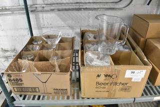 2 BRAND NEW SCRATCH AND DENT! Items Including Libbey 8485 Grande Collection 8.5 oz. Customizable Salud Grande Martini Glass - 7/Case and Acopa 60 oz. Customizable Glass Beer Pitcher - 5/Case. 2 Times Your Bid!