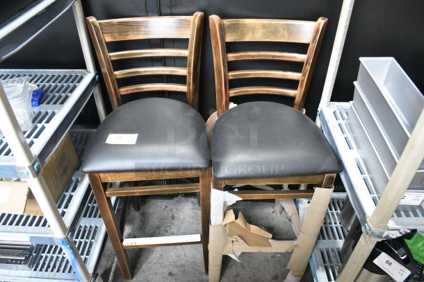 2 BRAND NEW SCRATCH AND DENT! Lancaster Table & Seating Wood Pattern Bar Height Chair w/ Black Seat Cushion. 2 Times Your Bid! - Image 1 of 6