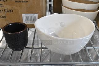2 BRAND NEW SCRATCH AND DENT! Items Including 303FUSSAKE1 Acopa Heika 1.5 oz. Black Matte Textured Stoneware Sake Cup - 24/Case and 6 White Bowls. 2 Times Your Bid.