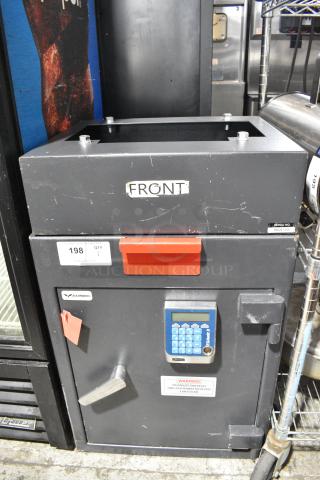 Amsec Metal Single Compartment Safe. Does Not Come w/ Combination.