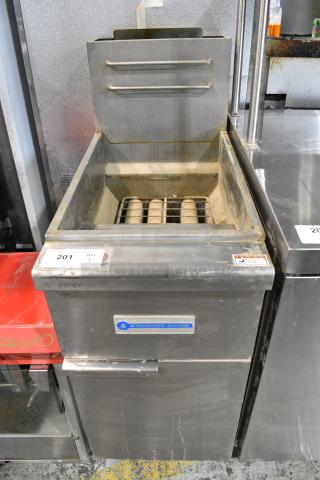 Standard Range SR-F3-NG Stainless Steel Commercial Floor Style Natural Gas Powered Deep Fat Fryer on Commercial Casters.