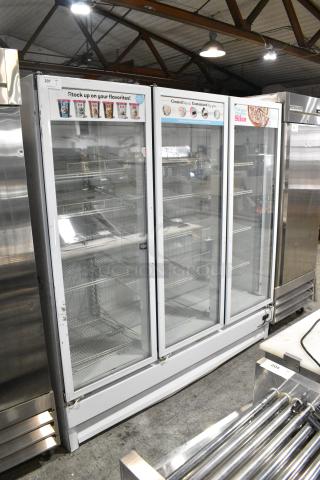 Global ULG80 Metal Commercial 3 Door Reach In Freezer Merchandiser w/ Poly Coated Racks. 115/208-230 Volts, 1 Phase.