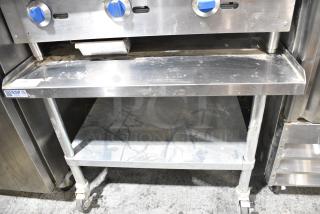 Stainless Steel Equipment Stand w/ Under Shelf on Commercial Casters.