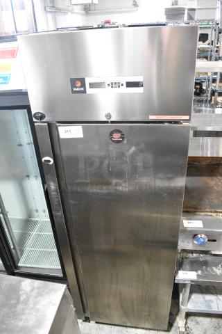 2019 Fagor QR-1 Stainless Steel Commercial Single Door Reach In Cooler on Commercial Casters. 110 Volts, 1 Phase. Tested and Powers On But Does Not Get Cold