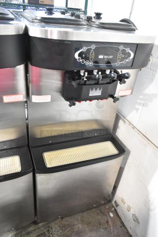 Taylor C713-33 Stainless Steel Commercial Floor Style Air Cooled 2 Flavor w/ Twist Soft Serve Ice Cream Machine on Commercial Casters. 208-230 Volts, 3 Phase. - Item #1187323