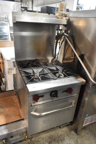 Vulcan SX24 Stainless Steel Commercial Floor Style Natural Gas Powered 4 Burner Range w/ Oven, Over Shelf and Back Splash.