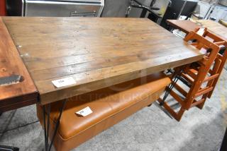 Wooden Table on Metal Legs.