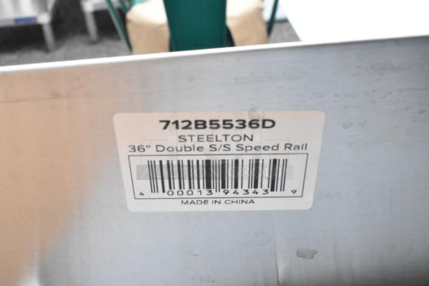 10 BRAND NEW SCRATCH AND DENT! Items Including 600WS1896HD Regency 16 Gauge Stainless Steel 18" x 96" Heavy Duty Wall Shelf, 712B5536D Steelton Stainless Steel Double Tier Speed Rail - 36", 712B5515D Steelton Stainless Steel Double Tier Speed Rail - 15", 600CDT48R Regency 16 Gauge 4' Clean Dish Table - Right Drainboard, 16436RTFWHM Lancaster Table & Seating 36" Round Thermo-Formed MDF Table Top with White Marble Finish, 600T3060G Regency 30" x 60" 18-Gauge 304 Stainless Steel Commercial Work Table with Galvanized Legs and Undershelf. 10 Times Your BId! - Image 5 of 11