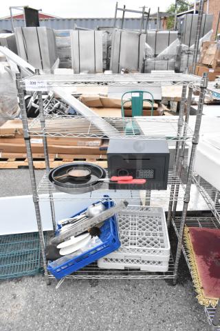 Chrome Finish 4 Tier Wire Shelving Unit w/ Contents Including Dish Caddy. BUYER MUST DISMANTLE. PCI CANNOT DISMANTLE FOR SHIPPING. PLEASE CONSIDER FREIGHT CHARGES.