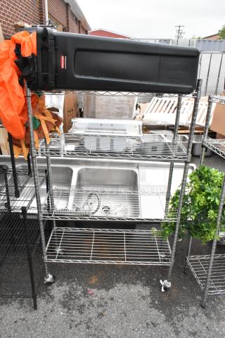 Chrome Finish 4 Tier Wire Shelving Unit w/ Contents Including Black Poly Slim Jim Trash Can on Casters. BUYER MUST DISMANTLE. PCI CANNOT DISMANTLE FOR SHIPPING. PLEASE CONSIDER FREIGHT CHARGES.
