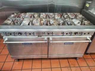 Imperial Natural Gas 10 Burner Range w/ two Standard Ovens. On Casters. No Backsplash. Missing knob.