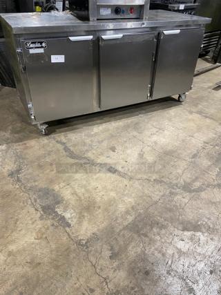 Leader Commercial 3 Door Refrigerated Work/Prep Table! With Poly Coated Racks! All Stainless Steel! Model ESLB72S/C Serial NO05S1519! 115V! On Casters!