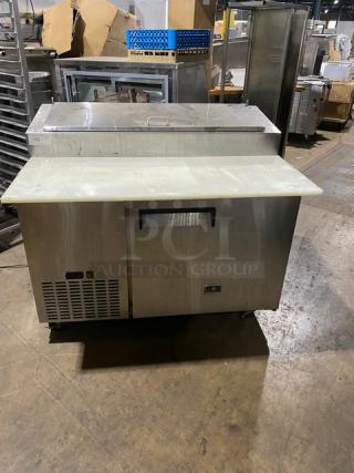 Kelvinator Commercial Stainless Steel Single Door Refrigerated Mega Top Pizza Prep Table! With Cutting Board! With Poly Coated Wire Rack! Model: KCPT50.6 SN: 1B44506371! 115V 1 Phase! On Casters! - Item #1187545