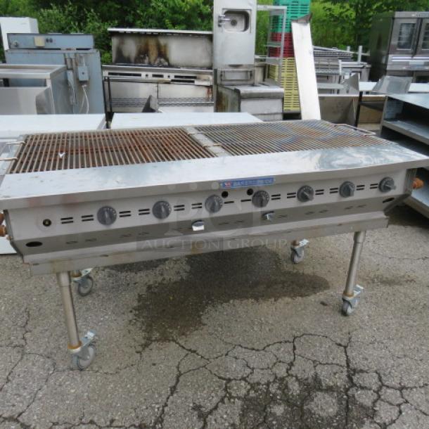 One Bakers Pride Ultimate Outdoor LP Gas Charbroiler On A Stainless Steel Stand On Casters. Model# CBBQ-60S. 68X34X36. - Image 1 of 4