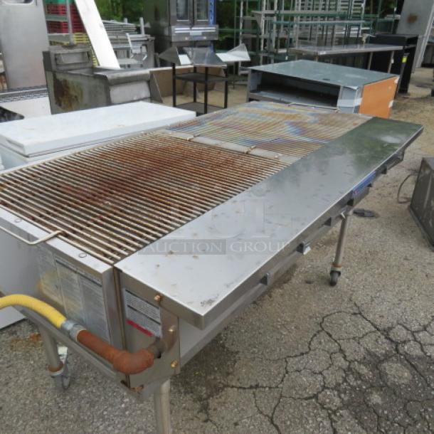 One Bakers Pride Ultimate Outdoor LP Gas Charbroiler On A Stainless Steel Stand On Casters. Model# CBBQ-60S. 68X34X36. - Image 2 of 4