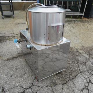 One Electric Potato Wash And Peel Machine On Casters.