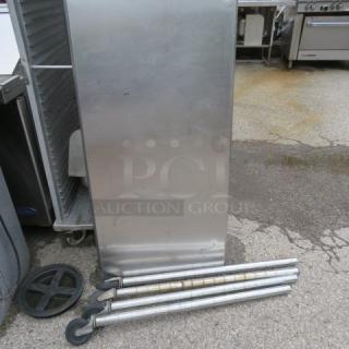 One Stainless Steel Table On Casters. 50X24X39