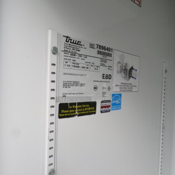 True refrigeration unit label showing model ODM-72F-LD, dimensions, and electrical specifications. Includes service tags.