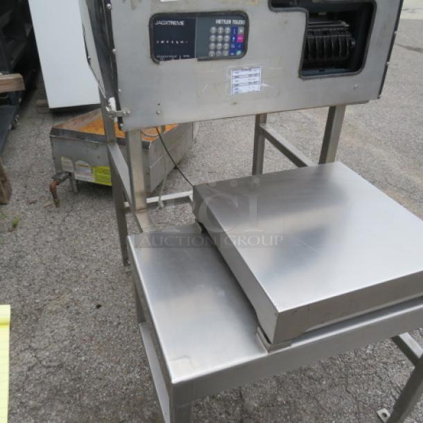 Industrial stainless steel scale with digital readout, used condition. Includes keypad and printer, model details on label.