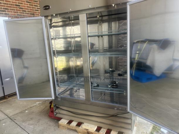 New SABA Model S-47R stainless steel 2-door refrigerated cooler on castors. Includes shelves, excellent condition.