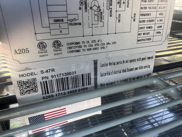 New SABA Stainless Steel 2-Door Refrigerated Cooler, Model S-47R, with castors. Features safety and certification labels.