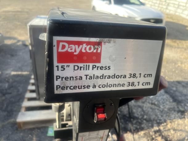Dayton 15” Drill Press, metal body, visible label with model details in English, Spanish, and French.