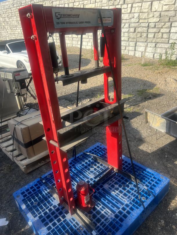 Strongway 20-Ton Hydraulic Shop Press, 30x24x60, red frame, used, visible brand and model labels, positioned on blue pallet.