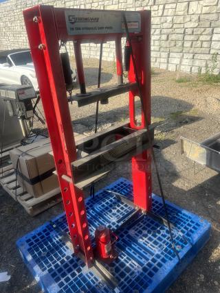 Strongway 20-Ton Hydraulic Shop Press, 30x24x60, red frame, used, visible brand and model labels, positioned on blue pallet.