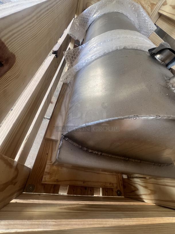 Brand new rinse tank for Douglas rack washer, shown still crated. Visible wood crate and protective bubble wrap.