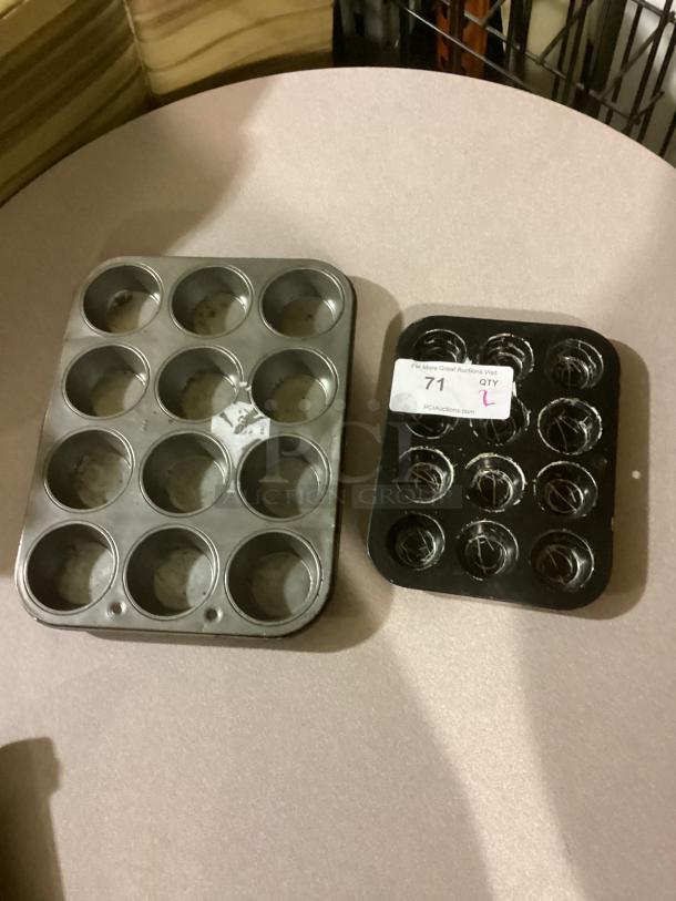 Two metal baking pans, medium and small, 12-cup and 6-cup, showing signs of use, auction label visible.