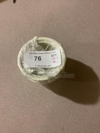 Medium gravy bowl, 5-1/8" diameter, wrapped in plastic. Auction label reads "76, QTY 2" from PCI Auctions.