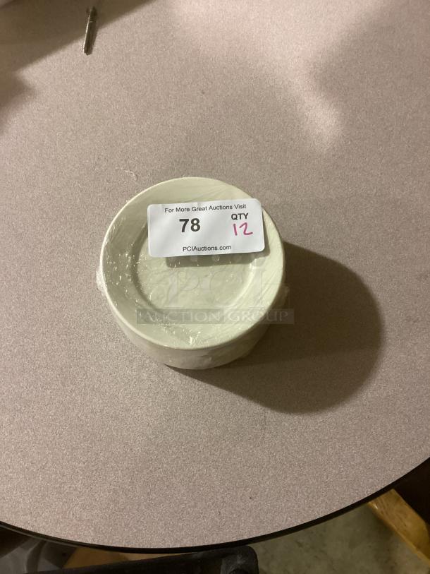 Medium Desert Plate, 6-3/8 inch, set of 12, wrapped, with auction tag number 78. Quantity noted as 12 on tag.