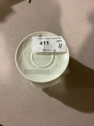 Medium desert plate, 6-1/4 inches, wrapped, tag showing "411", qty 11, from PCI Auctions. Ideal for collectors.