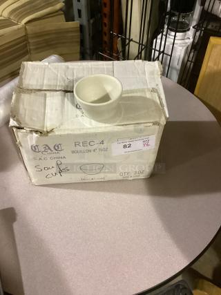 C.A.C. China soup cups, 4-inch, 7-1/4 oz, box of 36, one cup displayed on top, new condition.