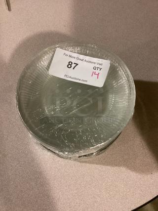 Clear glass bowl, 7-7/8 inches, set of 14. Wrapped in plastic, marked "QTY 14" on auction label from PCI Auctions.
